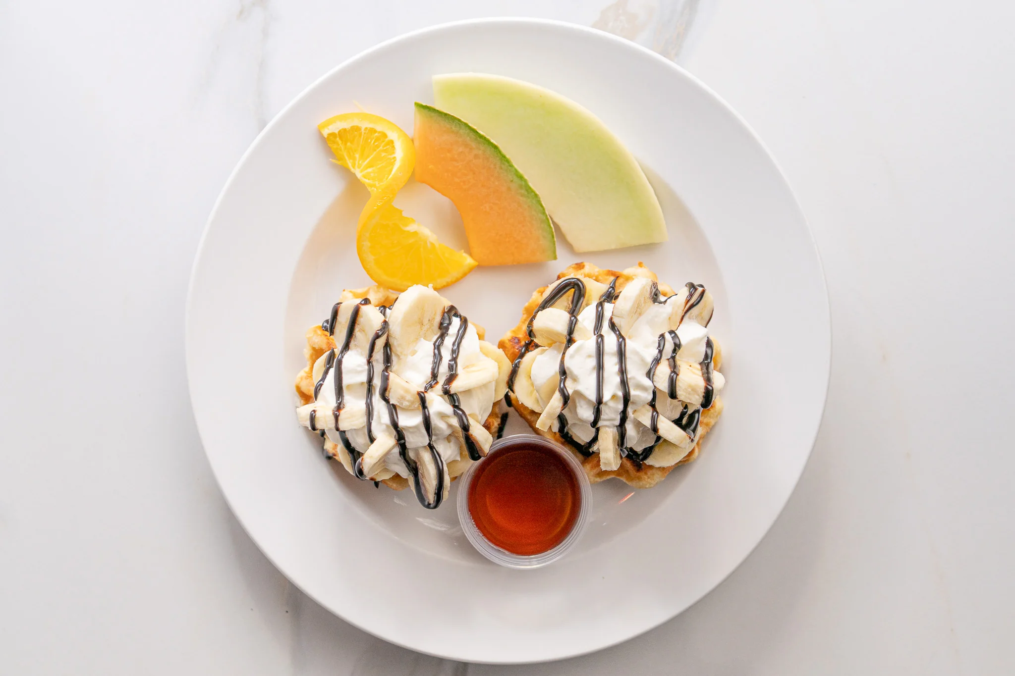 2 gaufres avec bananes et chocolat aux noisettes — Restaurant Le Moulin
