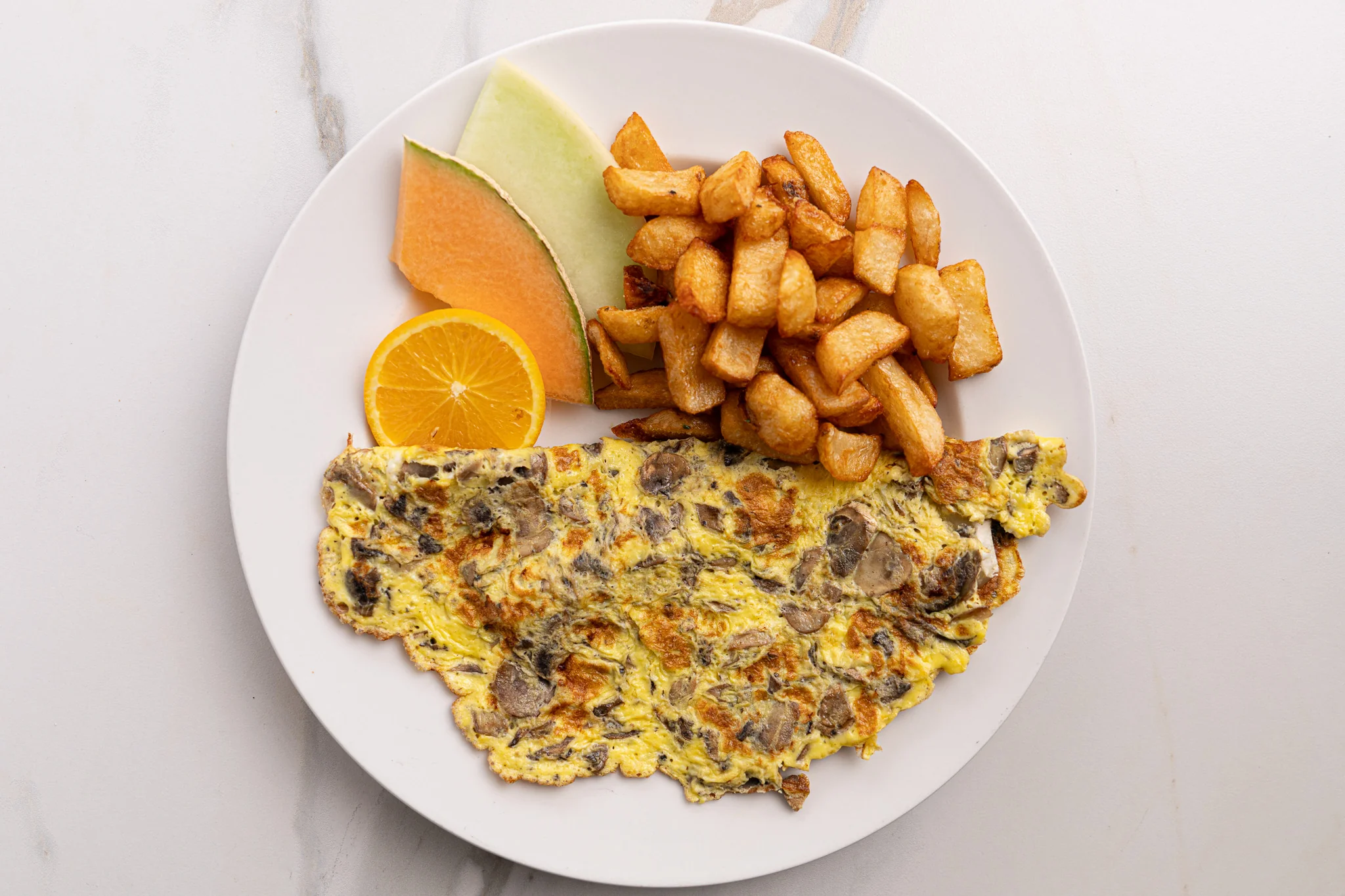 Omelette fromage brie et champignons sautés — Restaurant Le Moulin