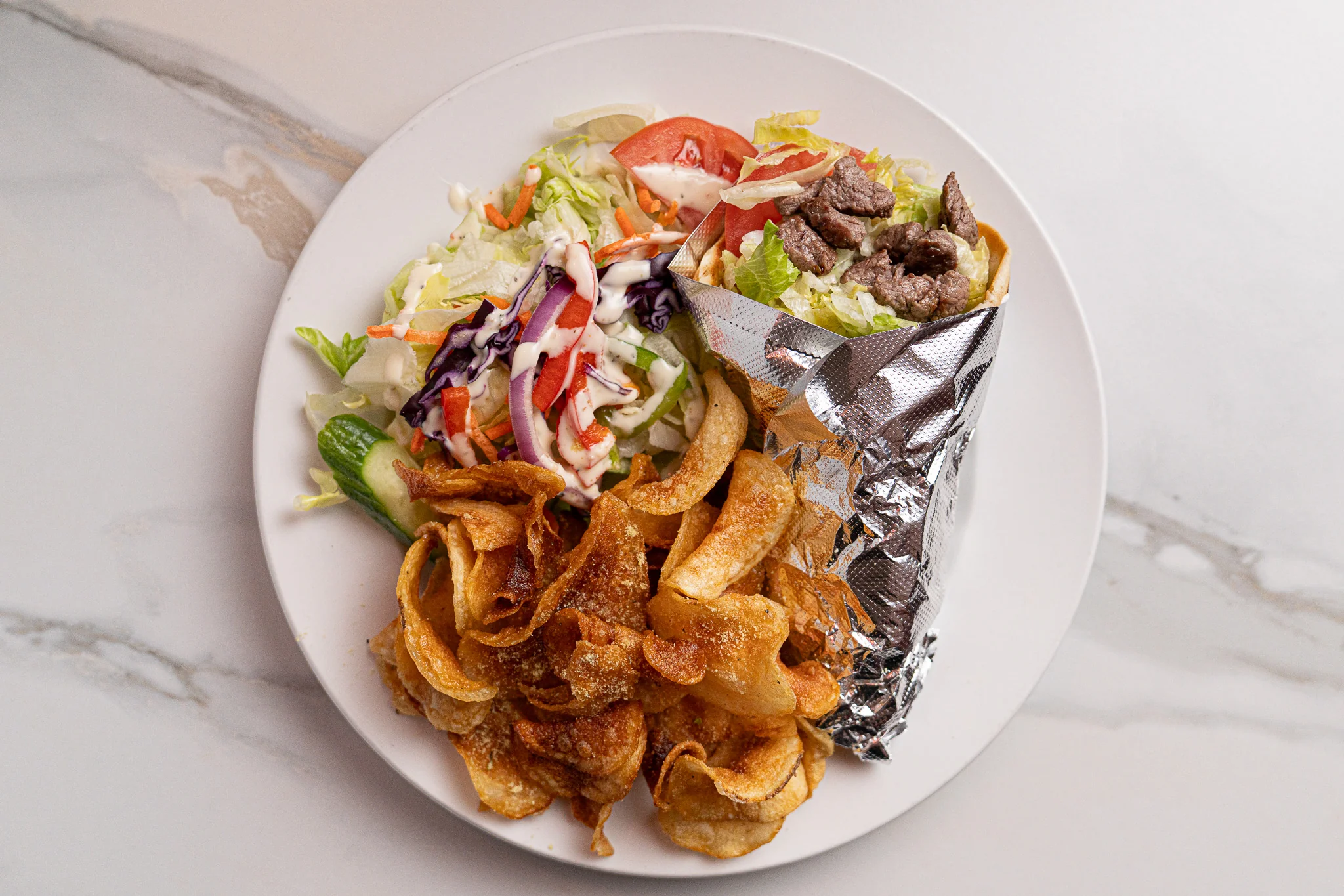 Assiette pita au filet mignon — Restaurant Le Moulin