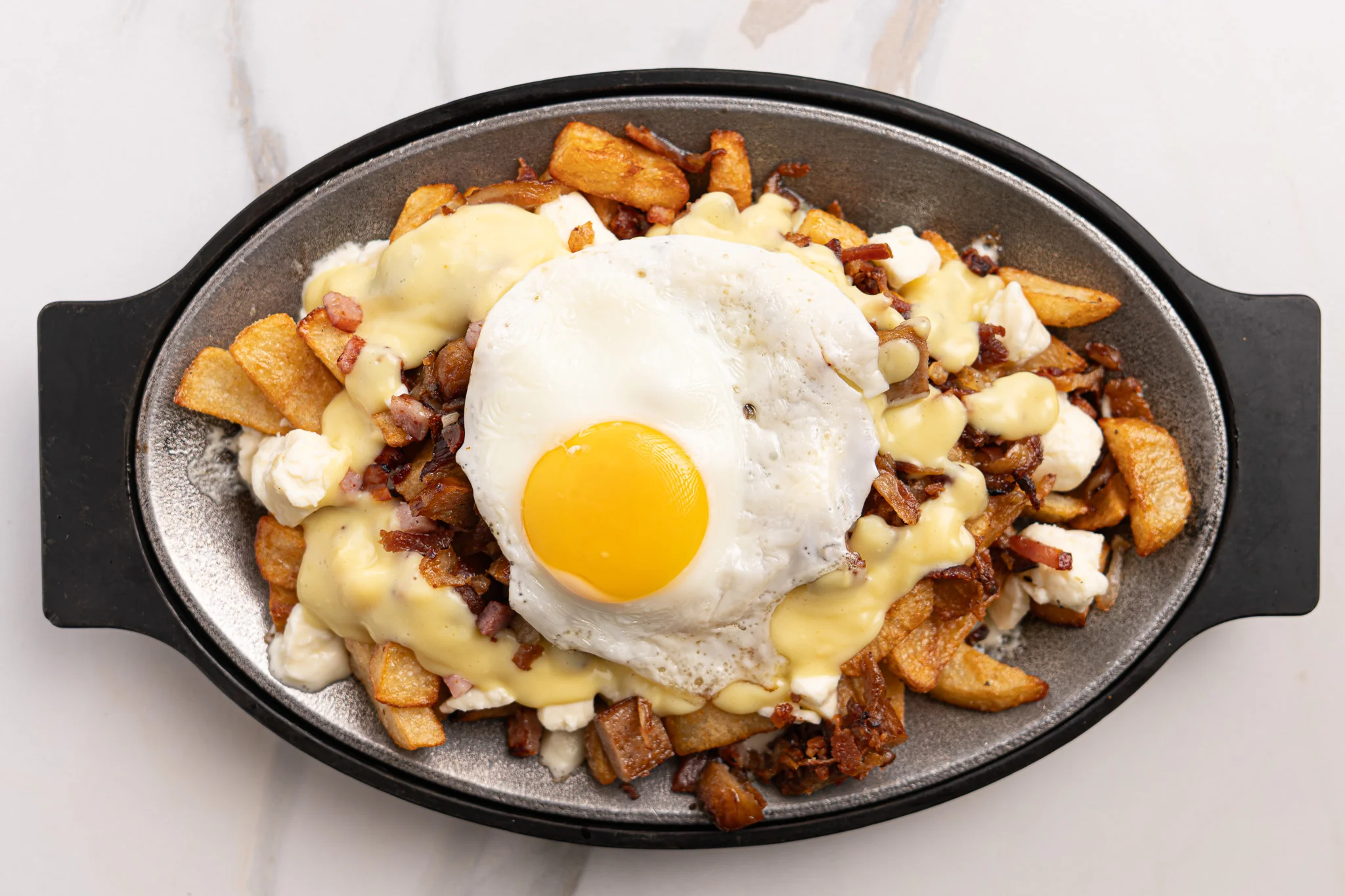 Poutine déjeuner — Restaurant Le Moulin