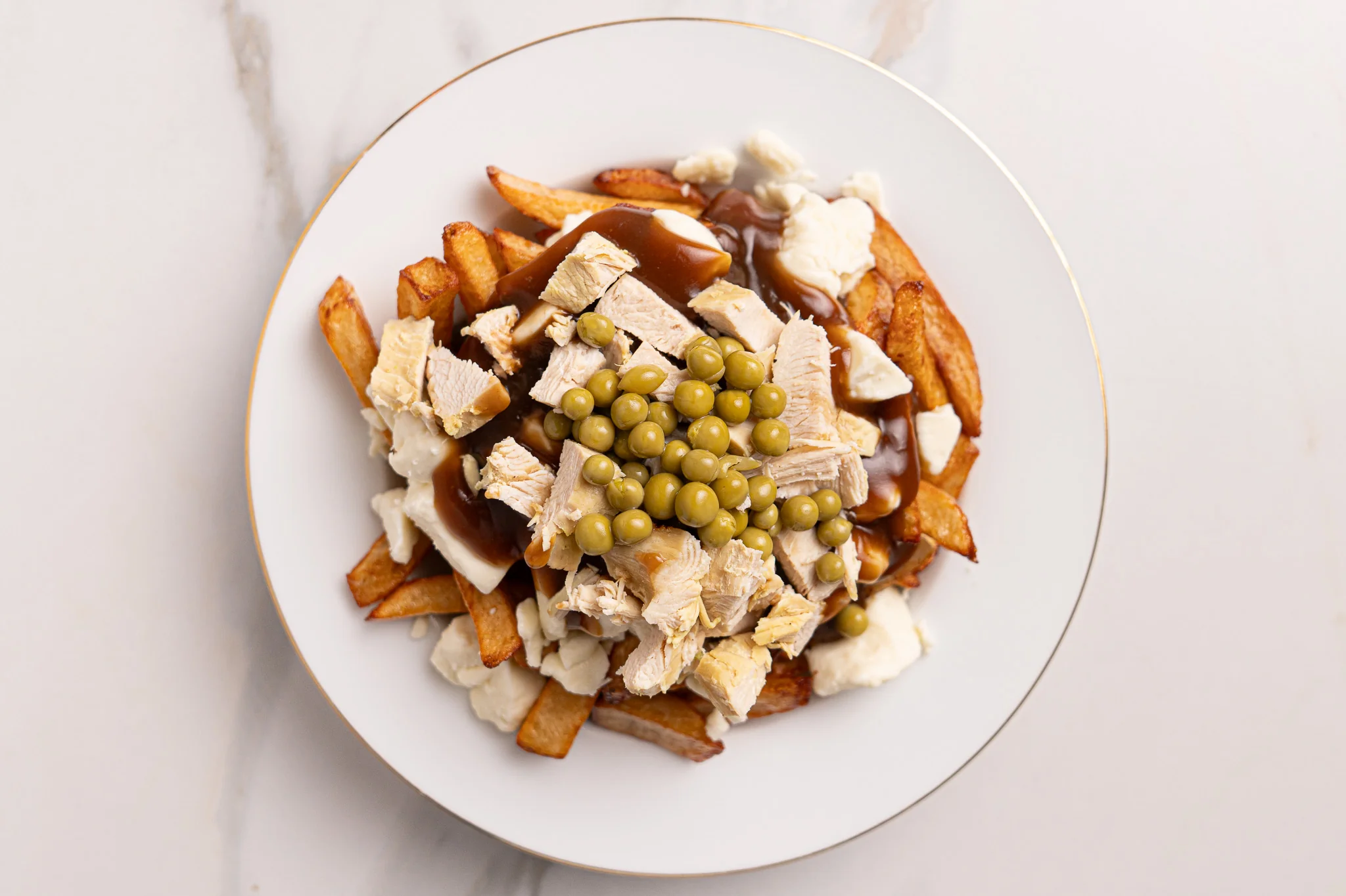 Poutine galvaude — Restaurant Le Moulin