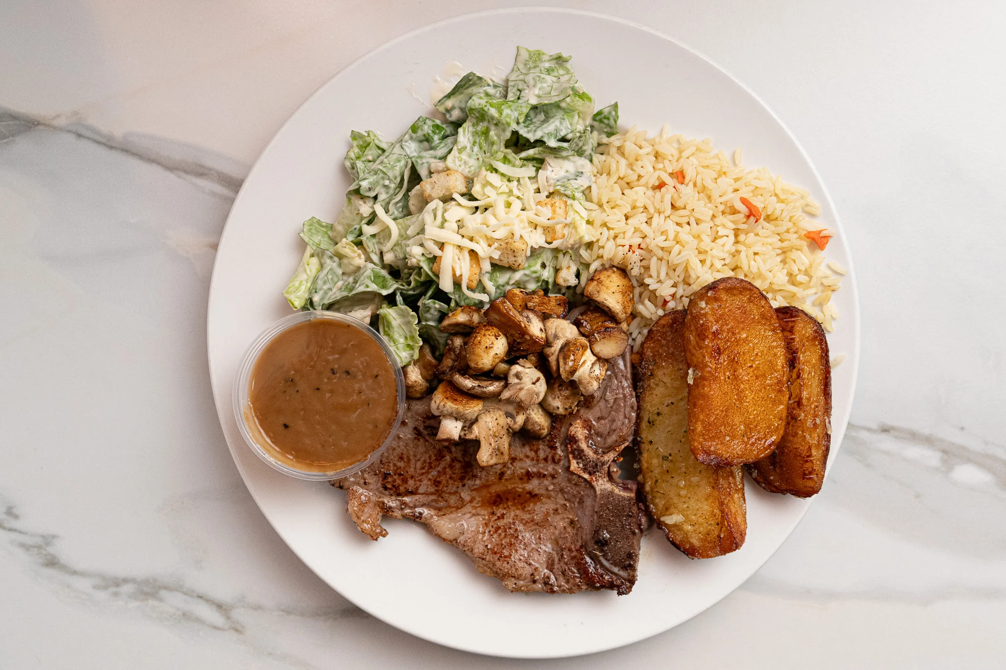 T-Bone aux champignons — Restaurant Le Moulin